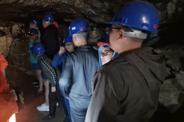 A group of our teenage kids making their way through White Scar Caves